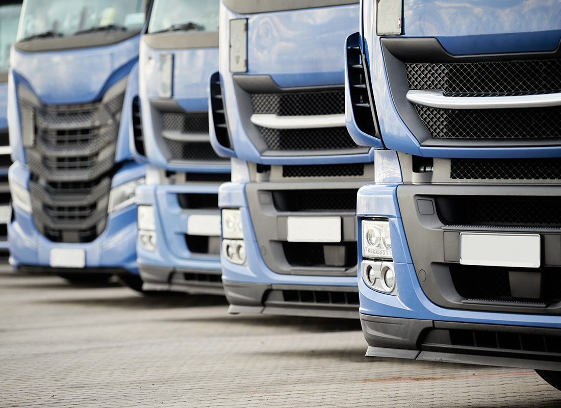 Business Insurance - Close-up of a Fleet of Blue Trucks